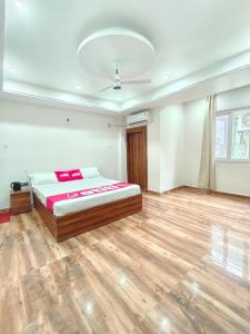 Ένα ή περισσότερα κρεβάτια σε δωμάτιο στο The Bliss Room 107 , Zero mile