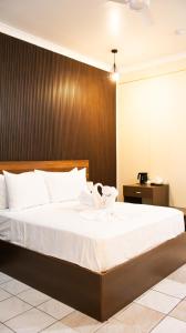 Postel nebo postele na pokoji v ubytování Valhali Guesthouse