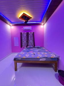 Ένα ή περισσότερα κρεβάτια σε δωμάτιο στο Juee's Holiday Homes +13 φωτογραφίες