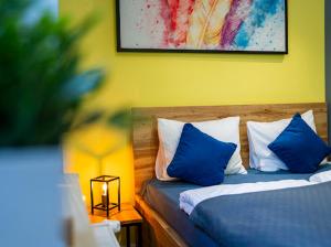 Postel nebo postele na pokoji v ubytování Zuzia Apartment - 50 m od Rynku