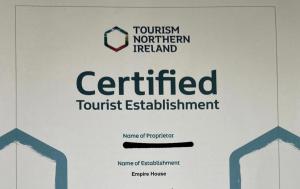 a sign with the words certifiedrequiredrequiredrequiredrequiredrequiredrequiredrequiredrequiredrequiredrequired at Empire House in Belfast +8 photos