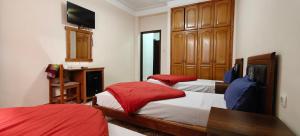 Ένα ή περισσότερα κρεβάτια σε δωμάτιο στο Aramca