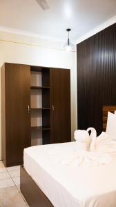 Postel nebo postele na pokoji v ubytování Valhali Guesthouse + 16 fotografií