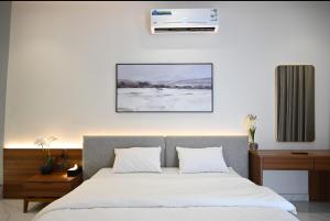 Postel nebo postele na pokoji v ubytování elite retreat + 17 fotografií