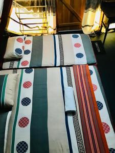 Postel nebo postele na pokoji v ubytování Canberra Resort & Beach Restaurant