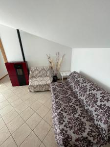 Ένα ή περισσότερα κρεβάτια σε δωμάτιο στο Casa Vacanze Caracol