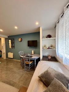 TV a/nebo společenská místnost v ubytování Au Silo