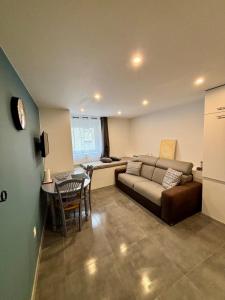 Posezení v ubytování Au Silo + 2 fotografie