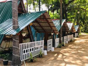 Zahrada ubytování Canberra Resort & Beach Restaurant