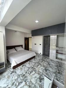 Postel nebo postele na pokoji v ubytování Zarax home stay