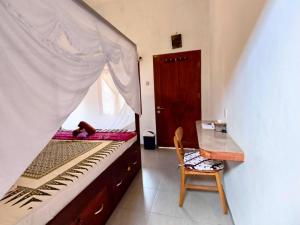 Postel nebo postele na pokoji v ubytování ZEN MOON Hostel