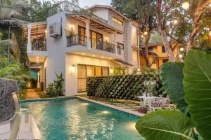 Πισίνα στο ή κοντά στο Lime Tree 4 BHK Villa with Private Pool Anjuna Beach Goa