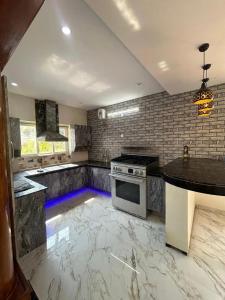 Kuchyň nebo kuchyňský kout v ubytování Zarax home stay