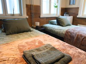 Ένα ή περισσότερα κρεβάτια σε δωμάτιο στο Satamatupa järvinäkymällä - Satamatupa with lake view +5 φωτογραφίες