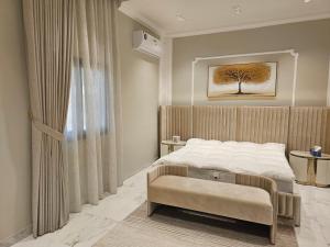 Ένα ή περισσότερα κρεβάτια σε δωμάτιο στο hatta sky