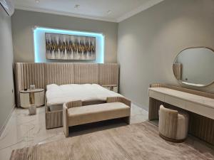 Ένα ή περισσότερα κρεβάτια σε δωμάτιο στο hatta sky