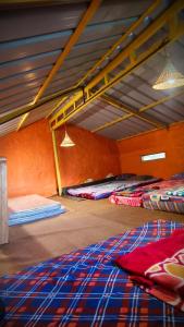 Postel nebo postele na pokoji v ubytování Madama Mudhouse Edenwood Retreats