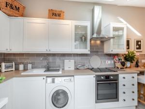 Køkken eller tekøkken på Neptune Cottage + 14 billeder