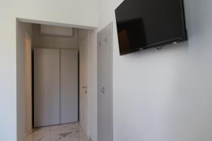 TV a/nebo společenská místnost v ubytování Astoria Guest House + 31 fotografií