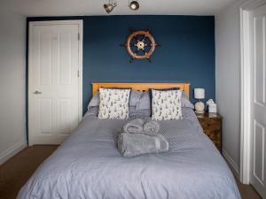 Postel nebo postele na pokoji v ubytování The Wheelhouse