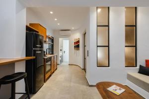 Kuchyň nebo kuchyňský kout v ubytování Kalea Luxury Villas + 136 fotografií