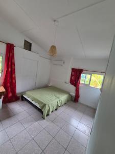 Ένα ή περισσότερα κρεβάτια σε δωμάτιο στο Les planifolias +4 φωτογραφίες