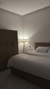 Postel nebo postele na pokoji v ubytování روڤان + 10 fotografií