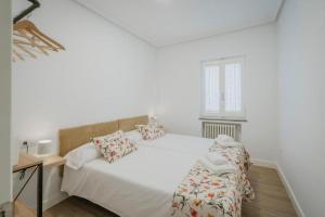 Postel nebo postele na pokoji v ubytování El Romazal