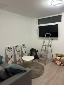 Μια τηλεόραση ή/και κέντρο ψυχαγωγίας στο Smart Home Bad Camberg - moderne Ferienwohnung