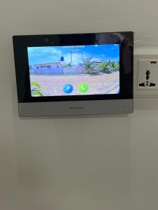 Μια τηλεόραση ή/και κέντρο ψυχαγωγίας στο The Pears Apartment East Legon