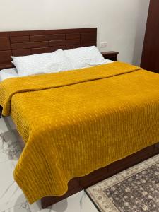 Ένα ή περισσότερα κρεβάτια σε δωμάτιο στο The Pears Apartment East Legon