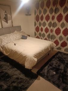 Ένα ή περισσότερα κρεβάτια σε δωμάτιο στο Willow Lodge