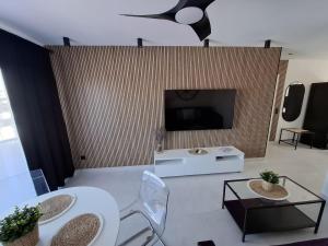 TV a/nebo společenská místnost v ubytování Casa Mario Ocean View