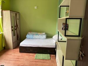 Postel nebo postele na pokoji v ubytování Manaalaya