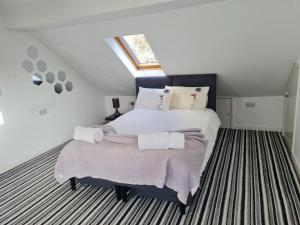 Postel nebo postele na pokoji v ubytování Secret Garden