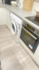 Η κουζίνα ή μικρή κουζίνα στο Harrow Flats