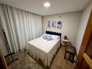 Ένα ή περισσότερα κρεβάτια σε δωμάτιο στο CasaMare +1 φωτογραφίες