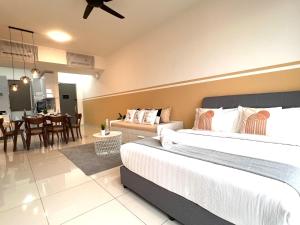 a bedroom with two beds and a dining room at Georgetown#Beacon Executive Suite SkyPool#Modern & Elegant Suite# in George Town +153 photos