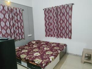 Ένα ή περισσότερα κρεβάτια σε δωμάτιο στο Bageshree homestay