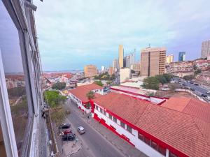 a view of a city with buildings and a street at Apartamento 1 Quarto - Baixa de Luanda in Luanda