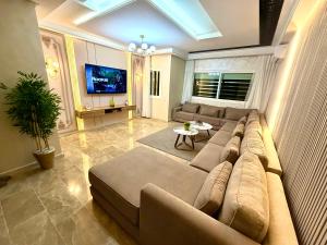 Χώρος καθιστικού στο Reda's Apparts centre ville wifi 200 Mo