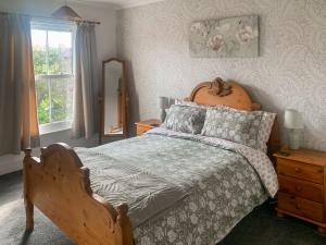 En eller flere senge i et værelse på Eastwyn + 5 billeder