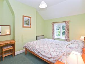 En eller flere senge i et værelse på Bridge Way - E1029