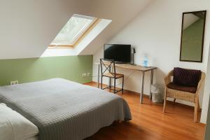 TV a/nebo společenská místnost v ubytování Schloss Hotel Kastellaun + 50 fotografií