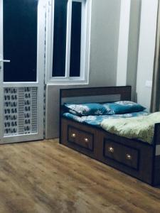 Postel nebo postele na pokoji v ubytování Hidden leaf Guesthouse