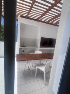 TV a/nebo společenská místnost v ubytování Triplex con 3 dormitorios, terraza y cochera