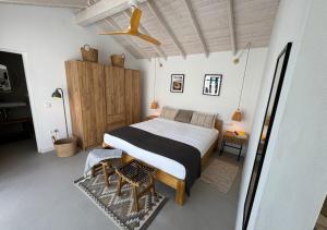 a bedroom with a large bed in a room at Casitas Santa Rita in Guatiza +63 photos