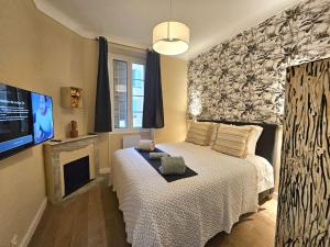 Postel nebo postele na pokoji v ubytování Monaco cocoon