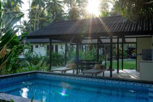 Bazén v ubytování Island Time Surf Resort nebo v jeho okolí