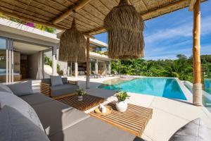 an image of a villa with a swimming pool at Stunning Koh Samui Villa with Infinity Pool & Ocean View "Villa Sabaï Dii" in Koh Samui